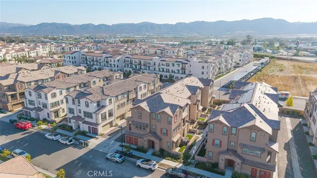 an aerial view of residential house with an outdoor space