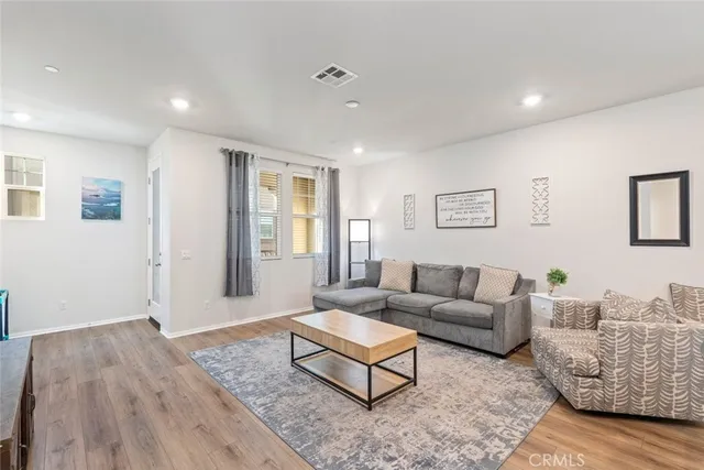 a living room with furniture and a couch