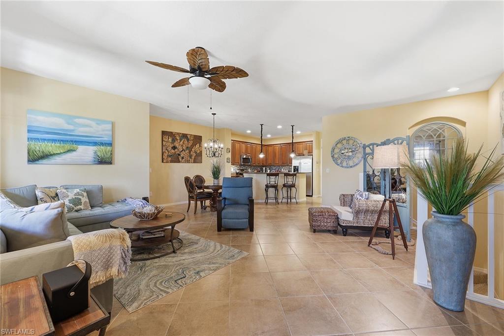 8986 Cambria Circle, Unit 2204 Naples, FL 34113 - Photo 5 of 36 a living room with furniture