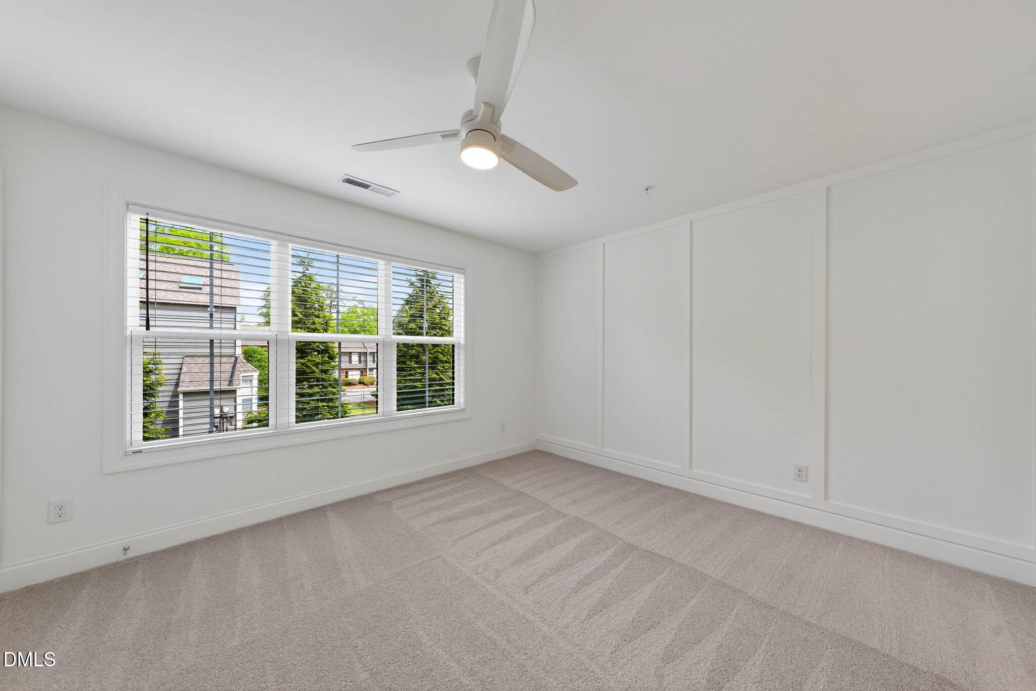 6820 Milligan Way, Unit 104 Raleigh, NC 27613 - Photo 24 of 39 a view of an empty room with a window