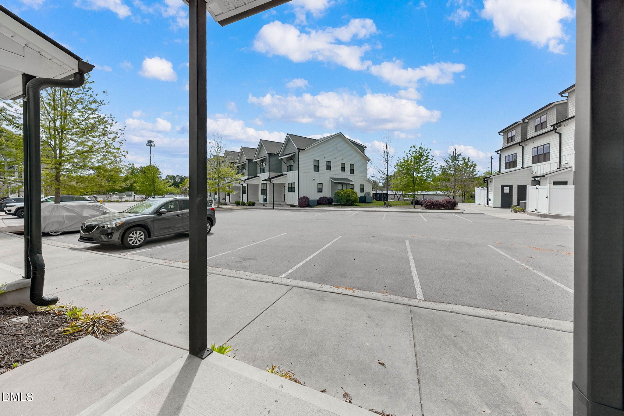 6820 Milligan Way, Unit 104 Raleigh, NC 27613 - Photo 39 of 39 a view of a street with a building in the background