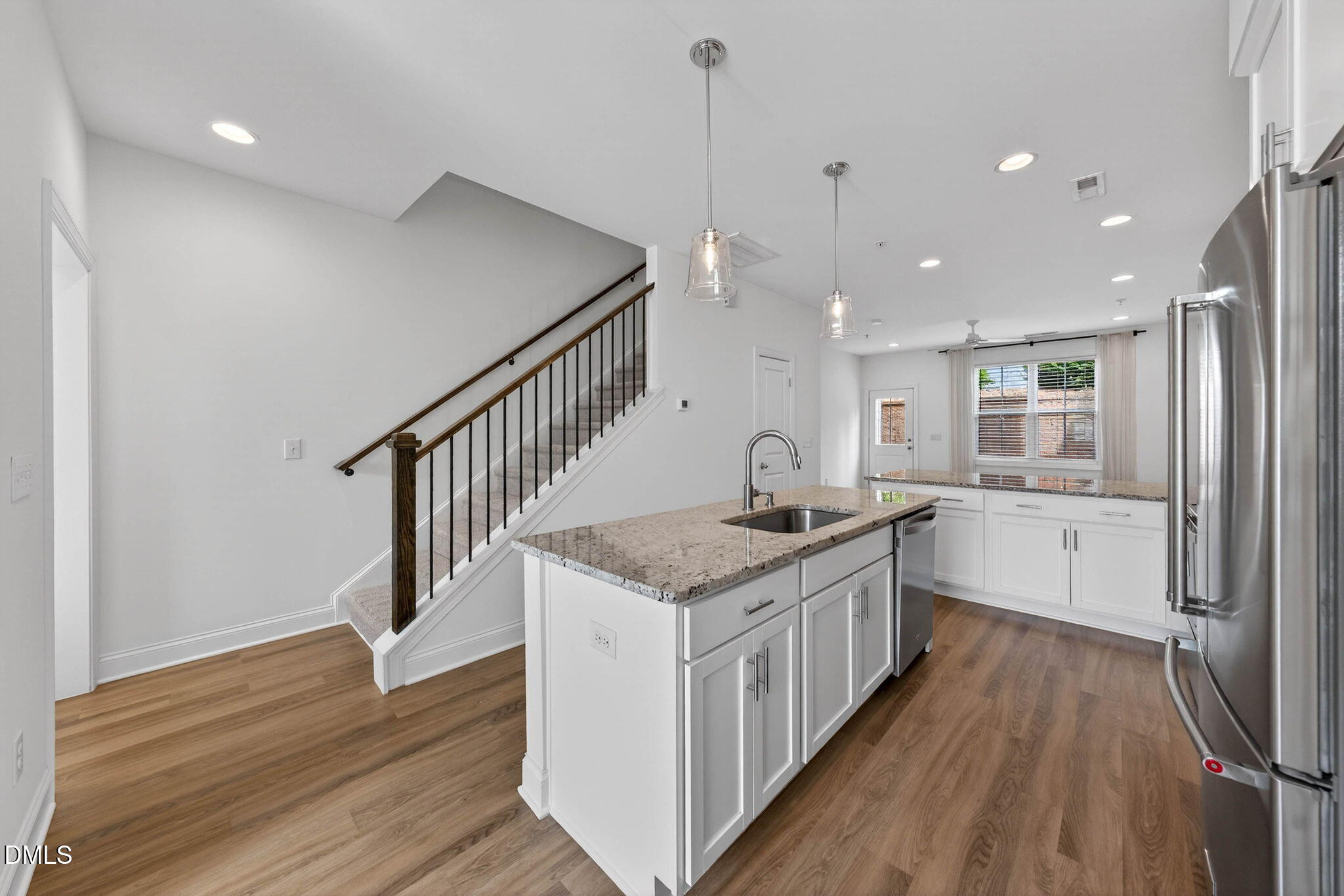 6820 Milligan Way, Unit 104 Raleigh, NC 27613 - Photo 10 of 39 a kitchen with a stove and a sink