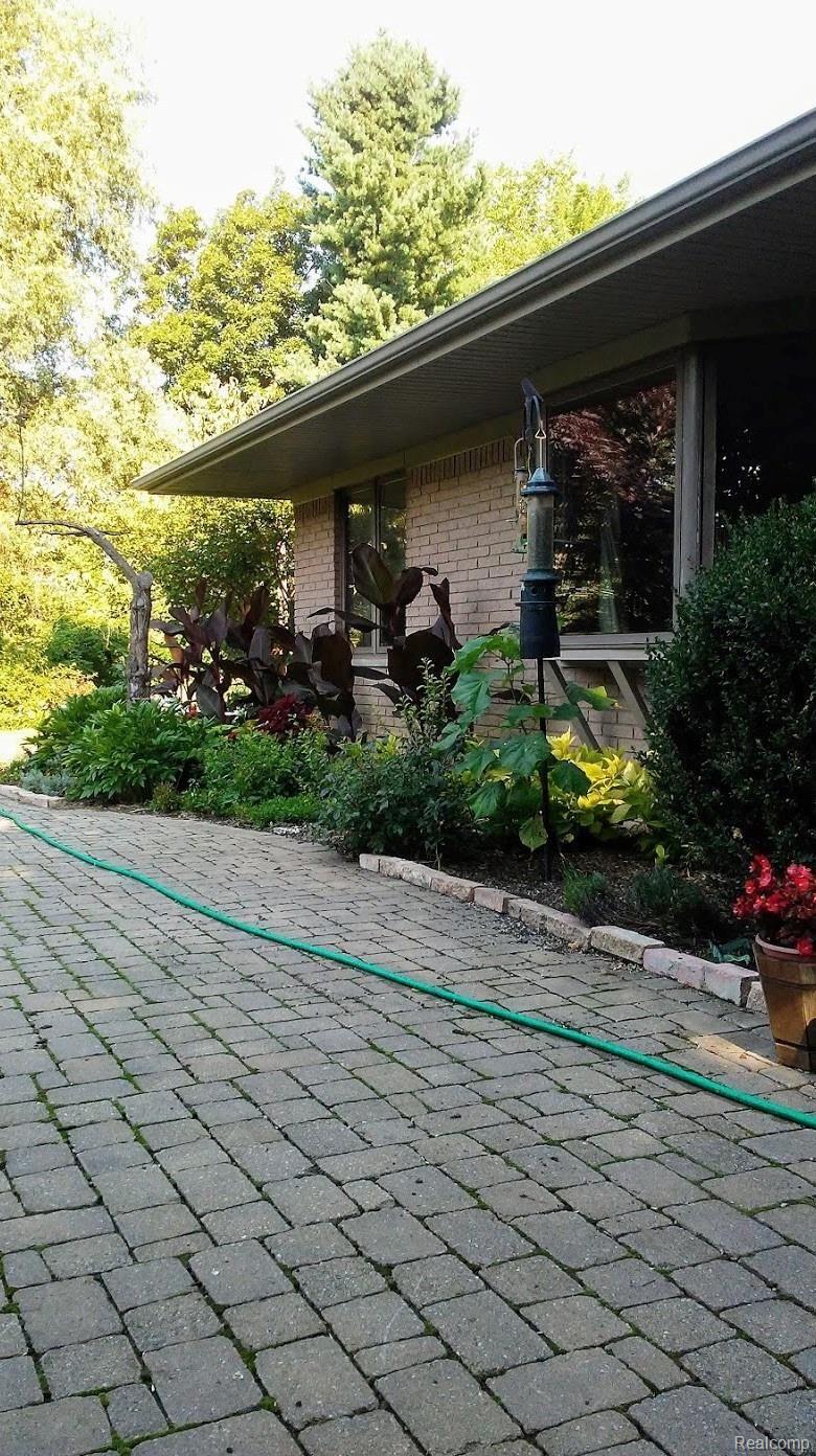 1600 Noble Road Leonard, MI 48367 - Photo 57 of 59 Pavers and beautifull landscaping