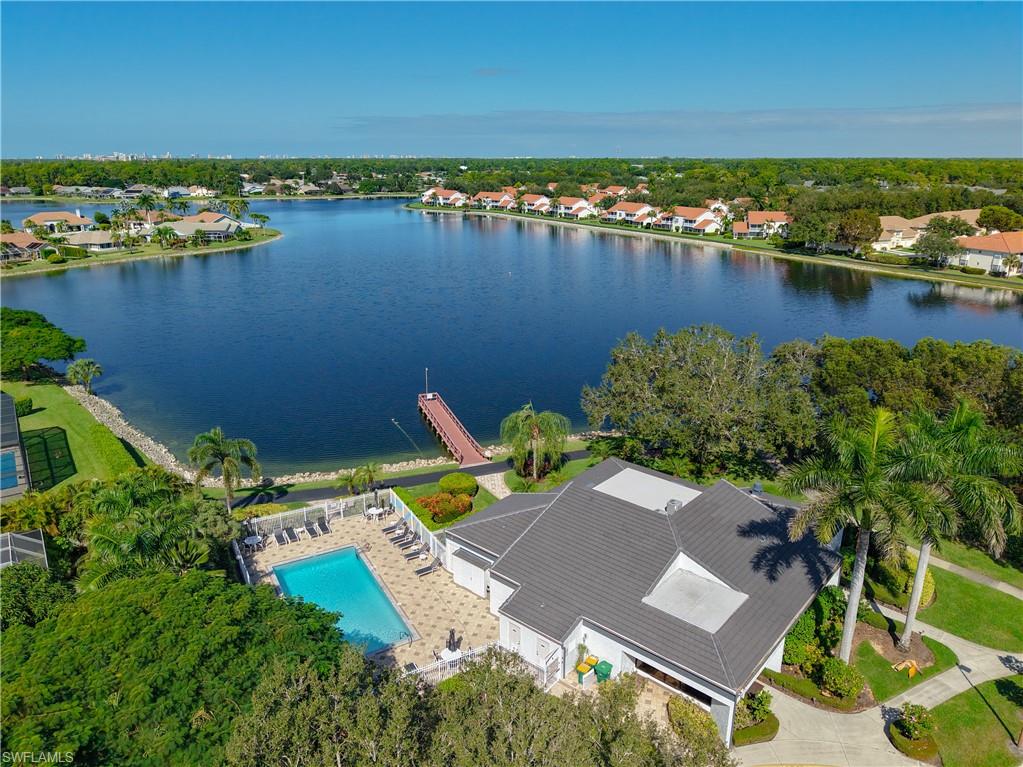 729 Landover Court, Unit 102 Naples, FL 34104 - Photo 28 of 28 an aerial view of a house with a lake view