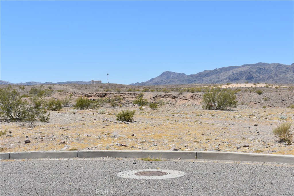 0 Calle Hernandez Road Needles, CA 92363 - Photo 11 of 29 a view of beach and mountain