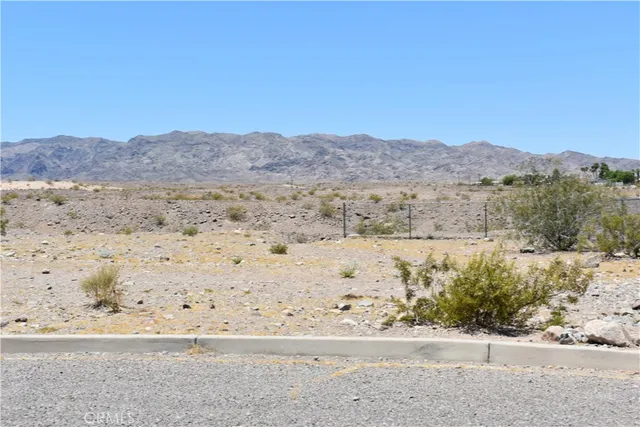 a view of mountain with wooden floor