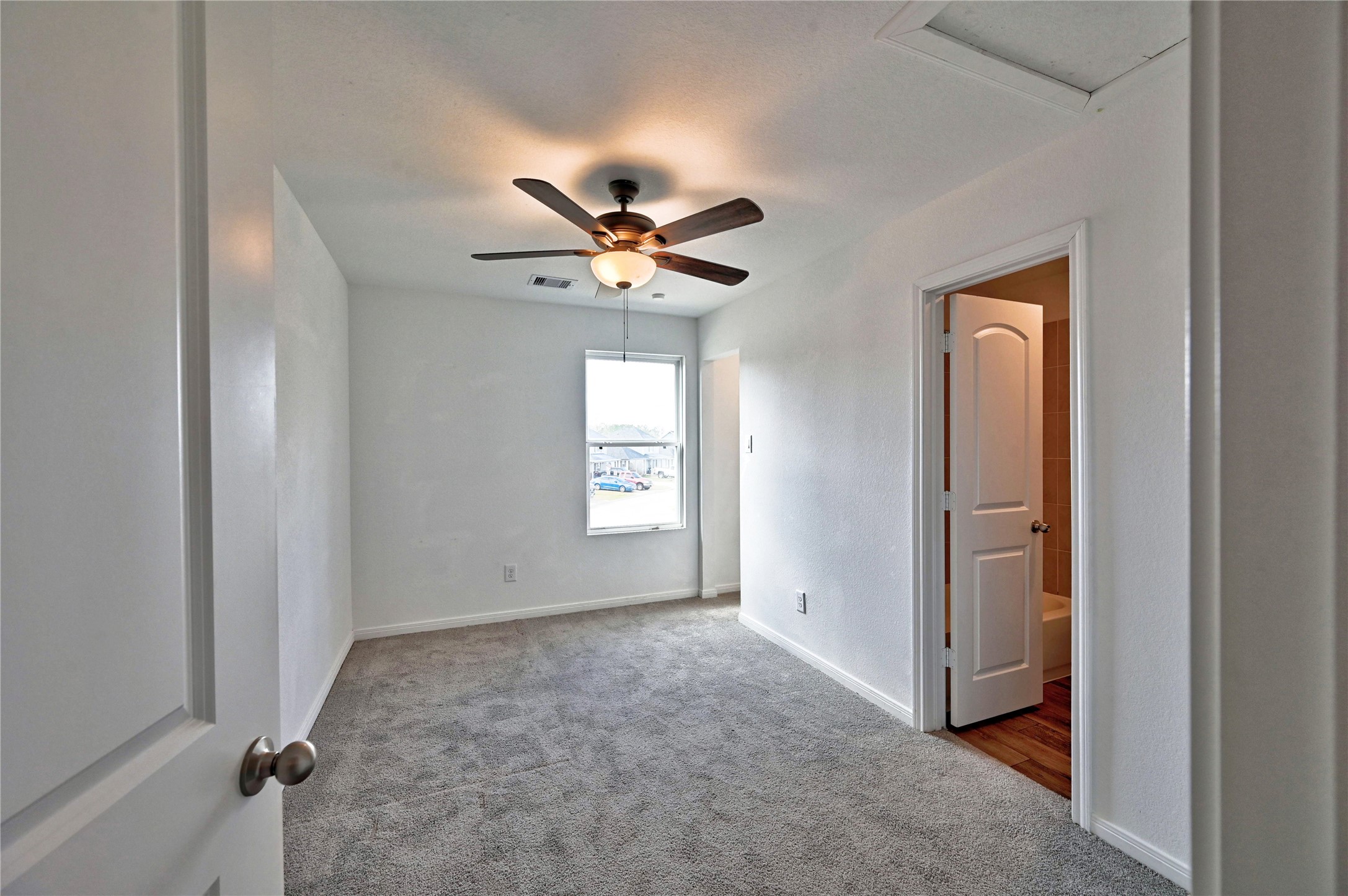 16623 Colleen Place Conroe, TX 77306 - Photo 21 of 44 Secondary bedroom #1 upstairs.