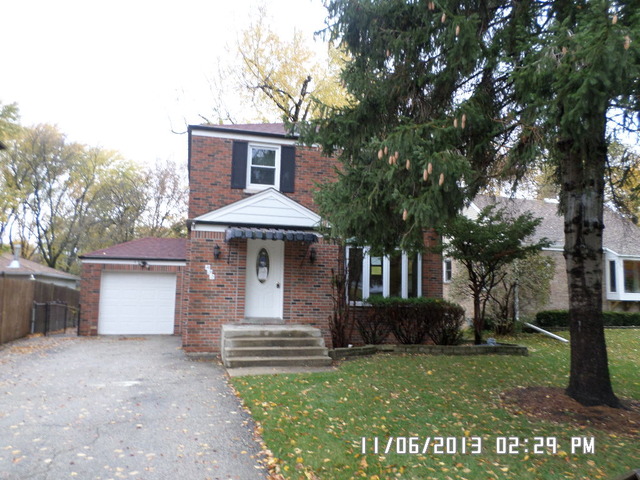 432 Harding Avenue Des Plaines, IL 60016 - Photo 1 of 20 a front view of a house with a yard and trees