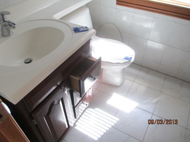 432 Harding Avenue Des Plaines, IL 60016 - Photo 12 of 20 a bathroom with a toilet and a sink