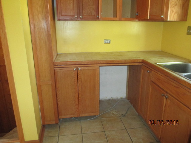 432 Harding Avenue Des Plaines, IL 60016 - Photo 9 of 20 a view of a kitchen with wooden floor