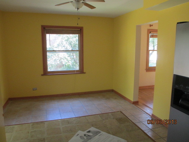 432 Harding Avenue Des Plaines, IL 60016 - Photo 10 of 20 a view of an empty room with a window