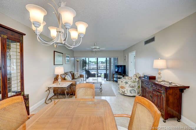 1950 Southwest Palm City Road, Unit 3209 Stuart, FL 34994 - Photo 7 of 64 Open dining and living area.