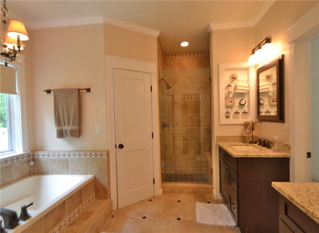 4257 Warren Road Franklin, TN 37067 - Photo 12 of 20 Upscale master bath . . . double vanities . . . separate tub . . . separate shower . . . built-ins . . .