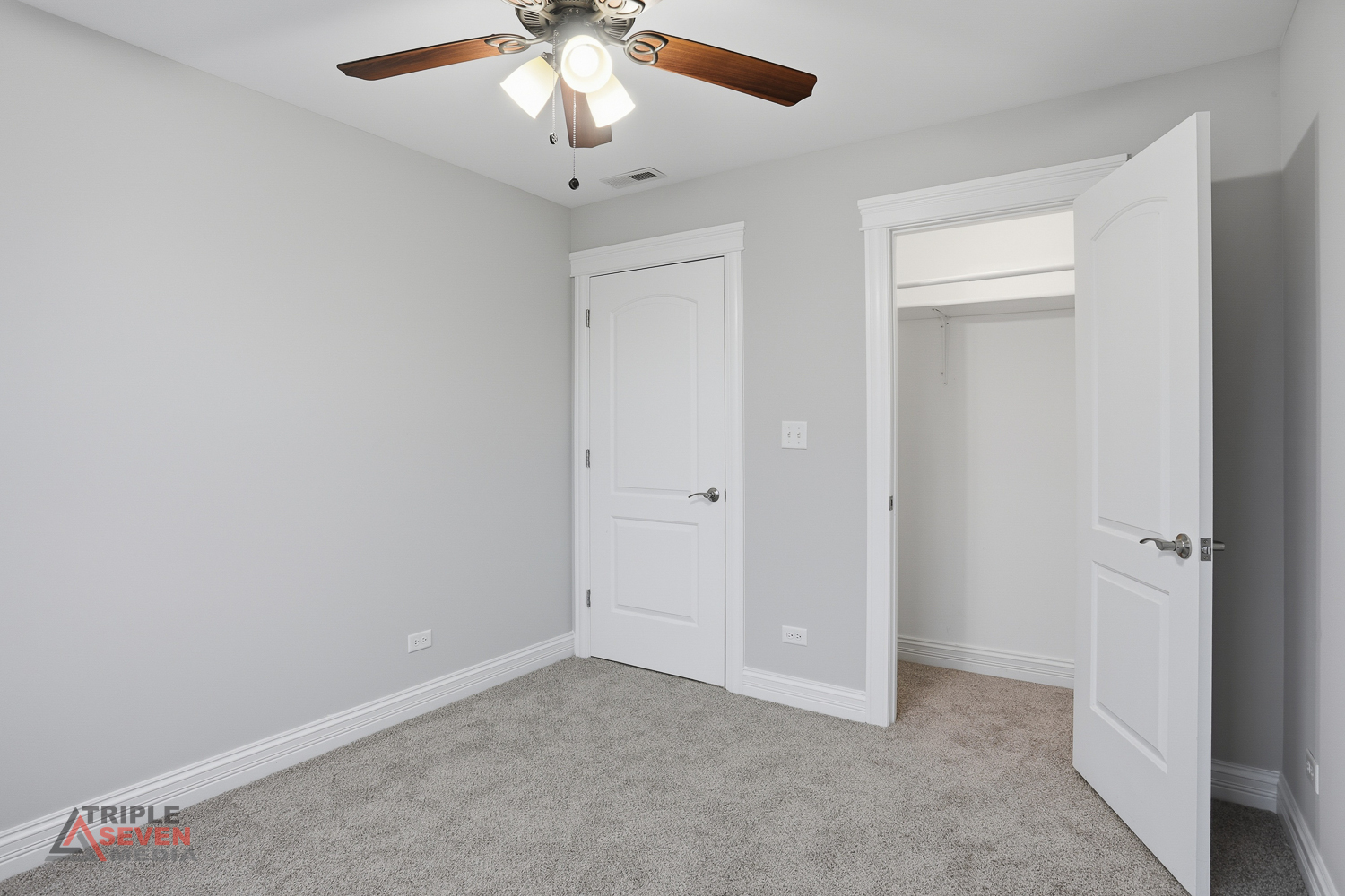 3832 West 64th Place Chicago, IL 60629 - Photo 23 of 35 an empty room with a empty space and a ceiling fan
