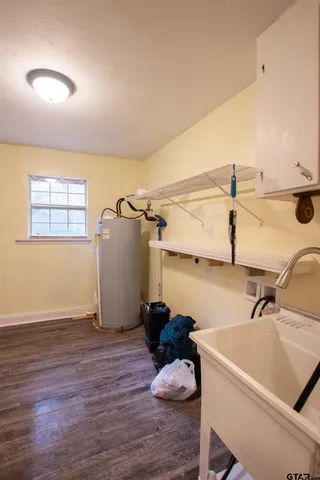 a view of a room and wooden floor