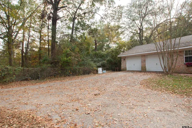 a house with trees in front of it
