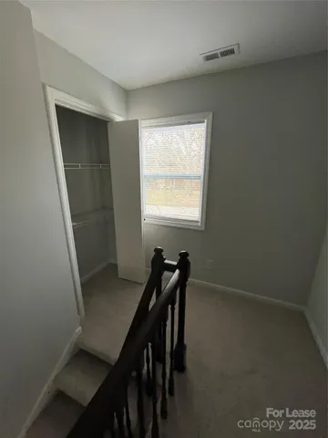 a workspace with furniture and window