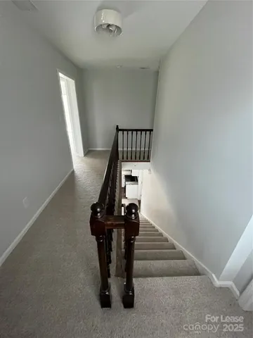 a view of entryway with stairs