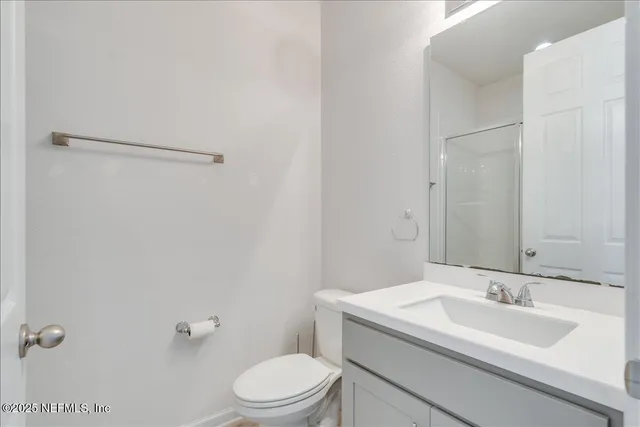 an empty room with a bathroom