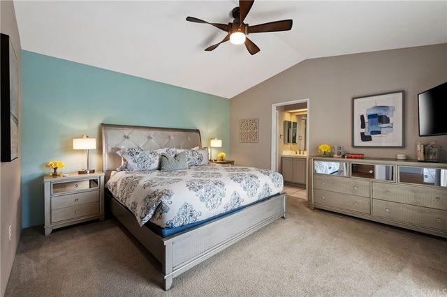 a bed room with a bed and furniture