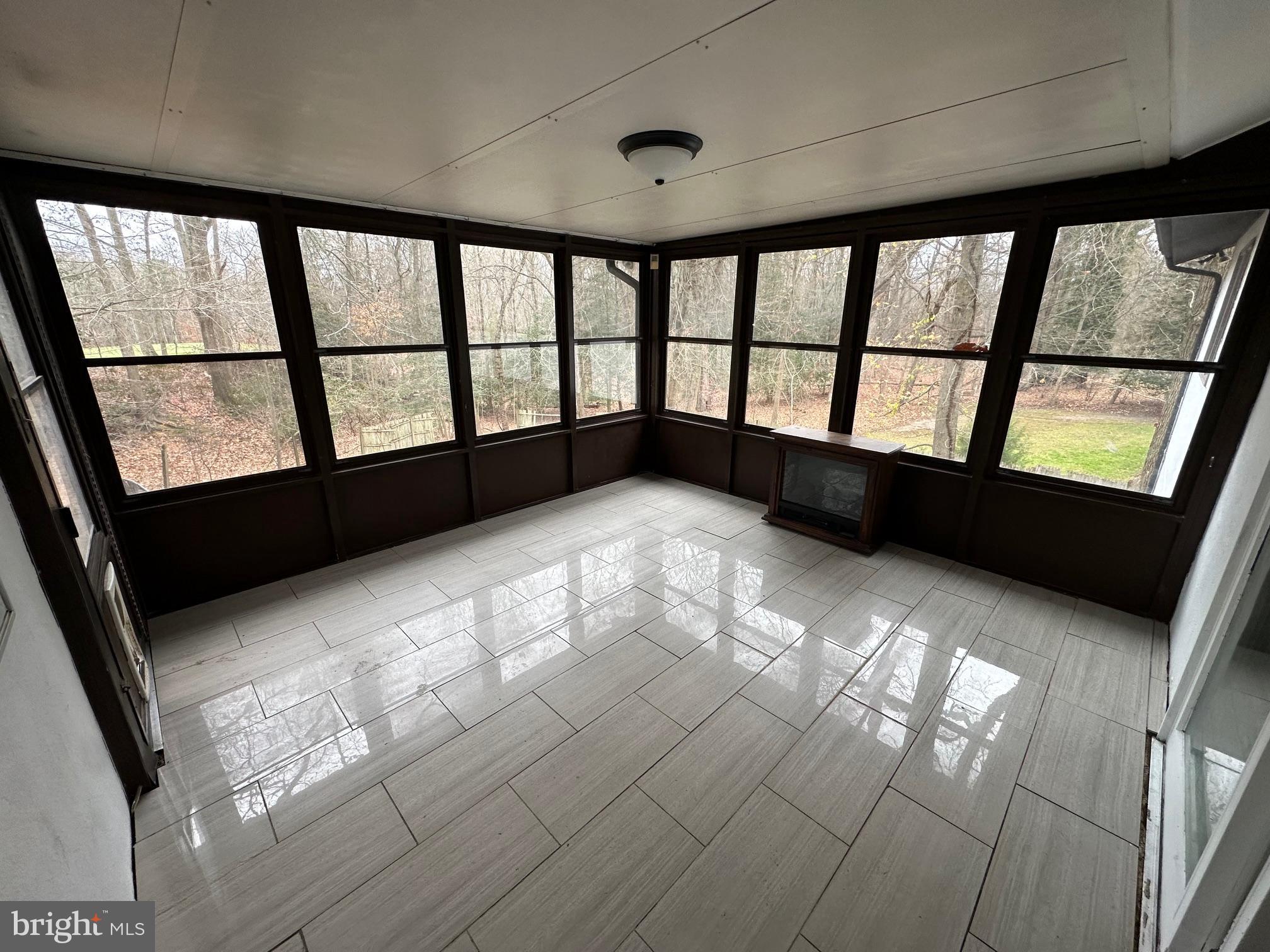 26 Sherri Way Clementon, NJ 08021 - Photo 13 of 37 a view of an empty room with a window