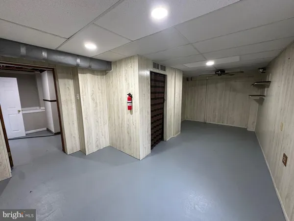 en empty room with windows