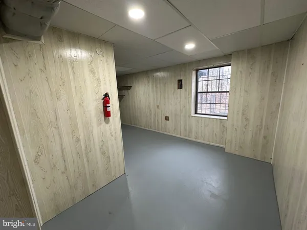 a view of an empty room with shelves
