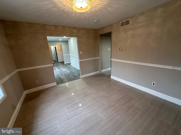 a view of livingroom with furniture and wooden floor