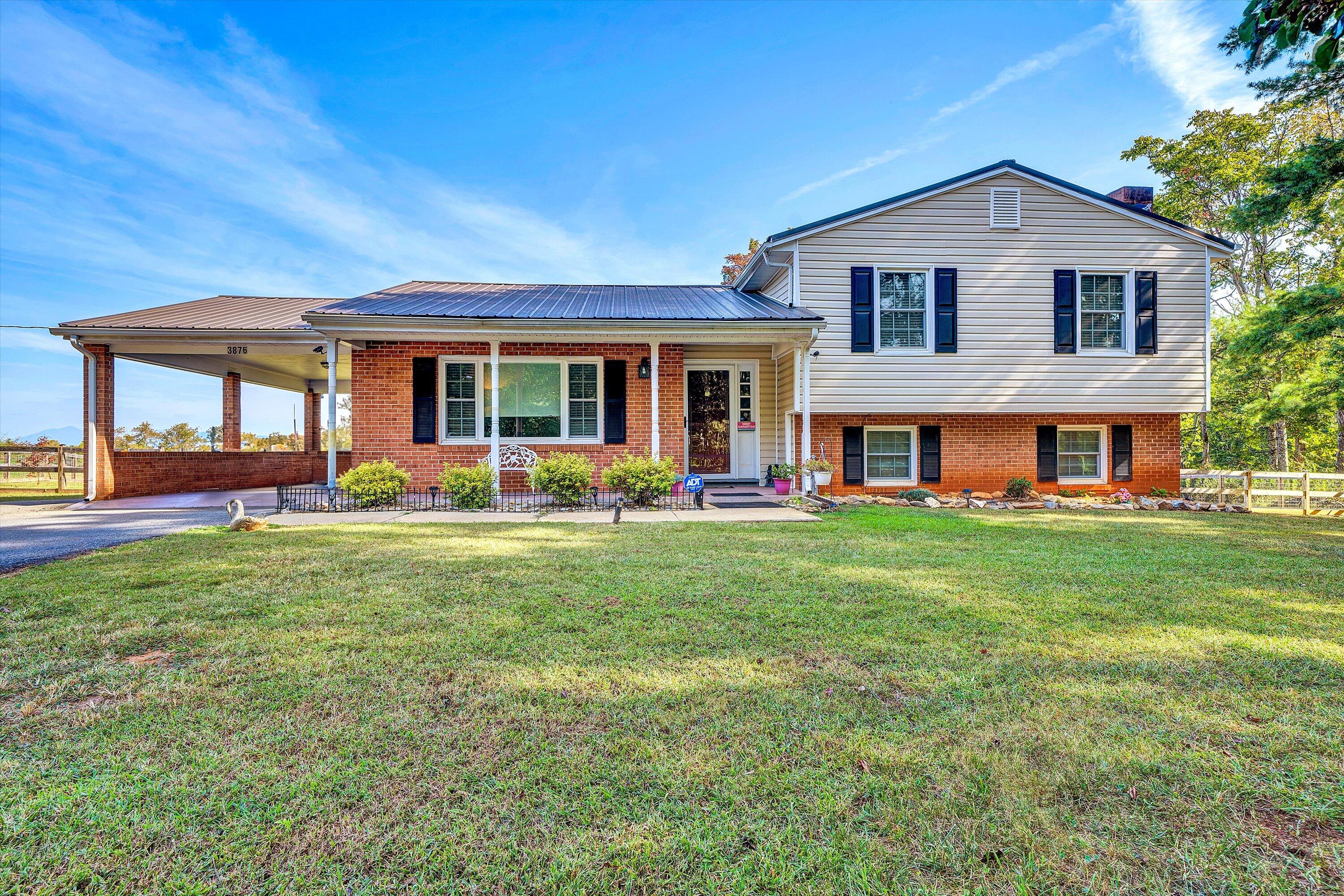 front view of a house with a yard