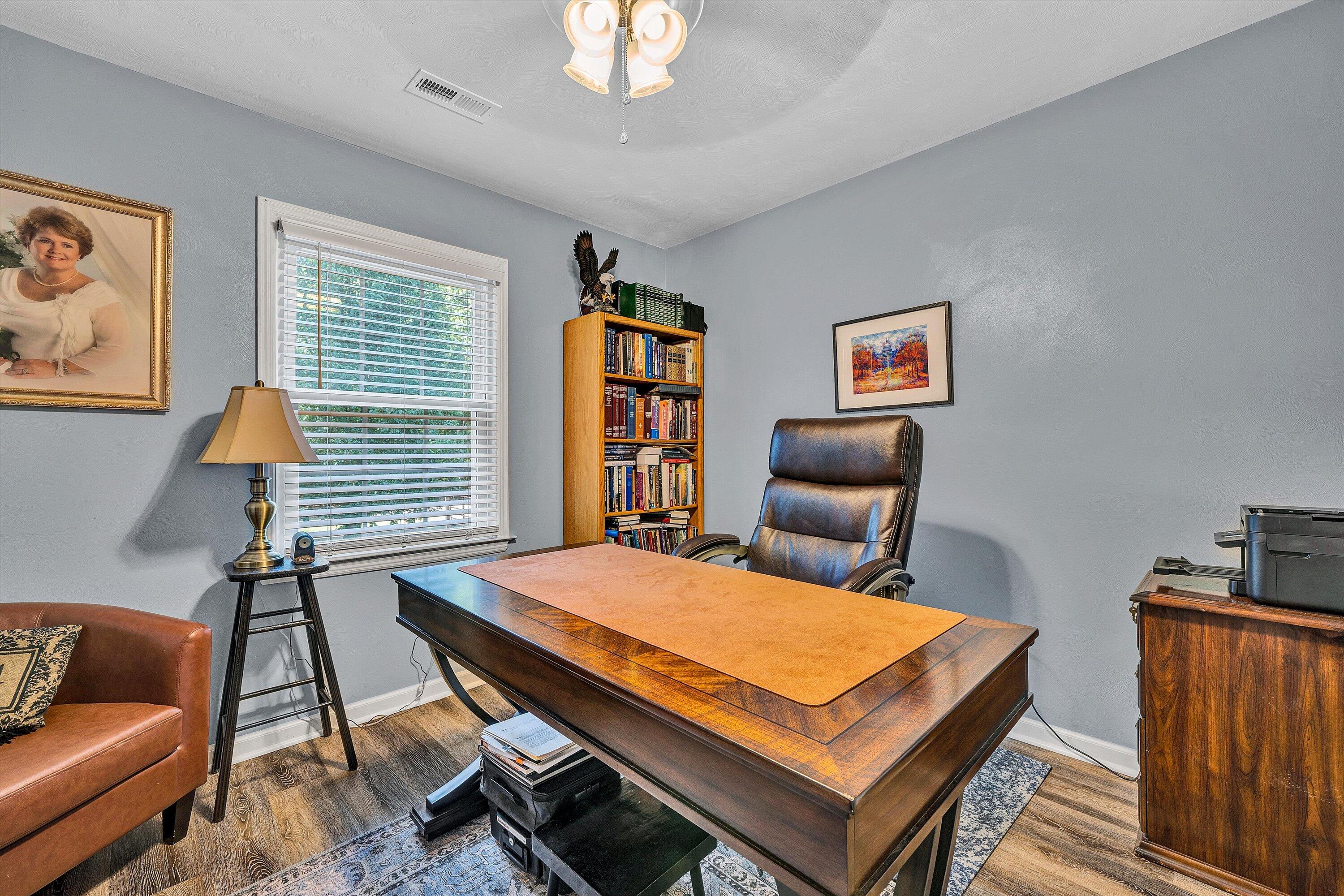 3876 Shingle Block Road Bedford, VA 24523 - Photo 18 of 29 a bedroom with furniture and a lamp