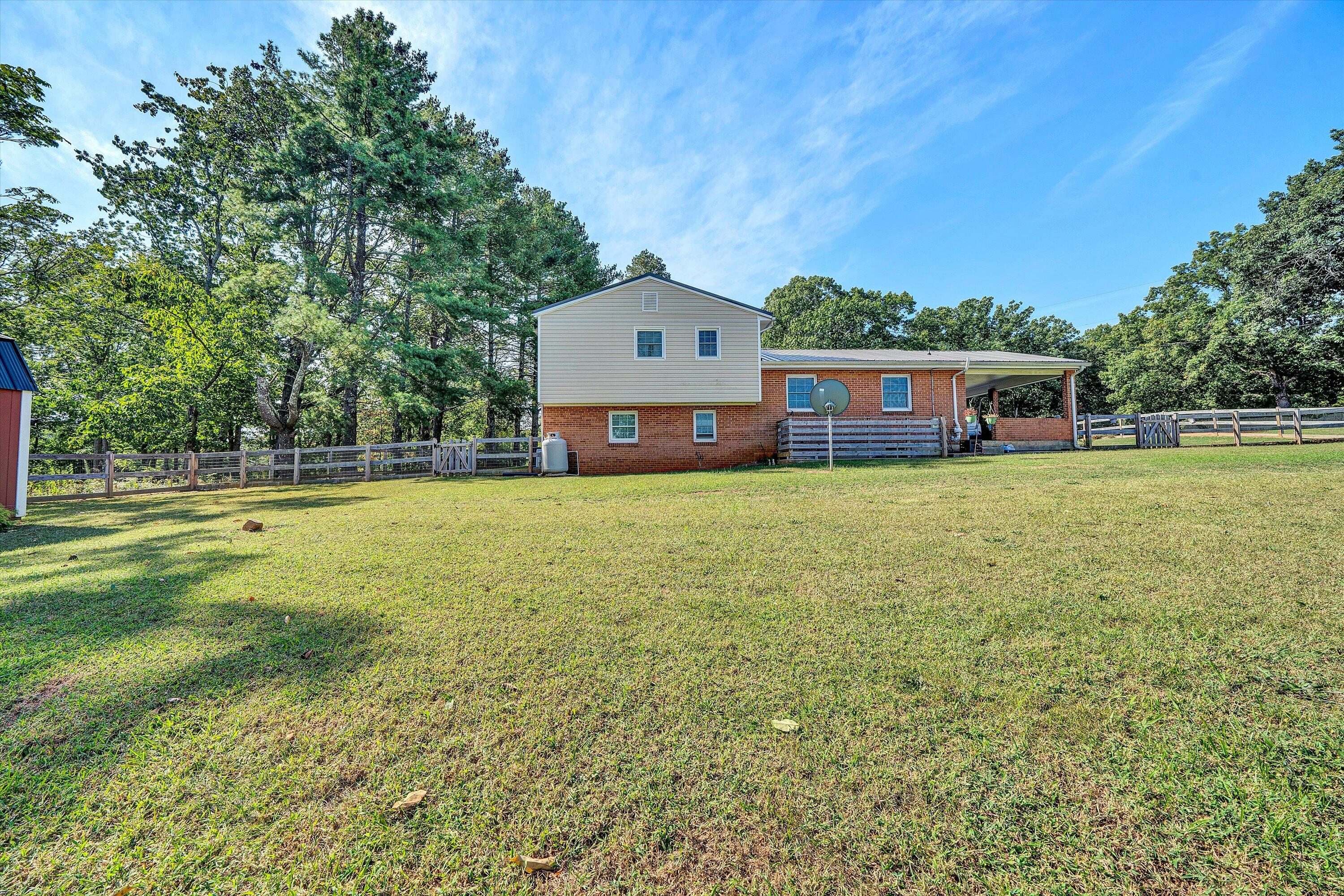3876 Shingle Block Road Bedford, VA 24523 - Photo 28 of 29 a view of a house with a big yard