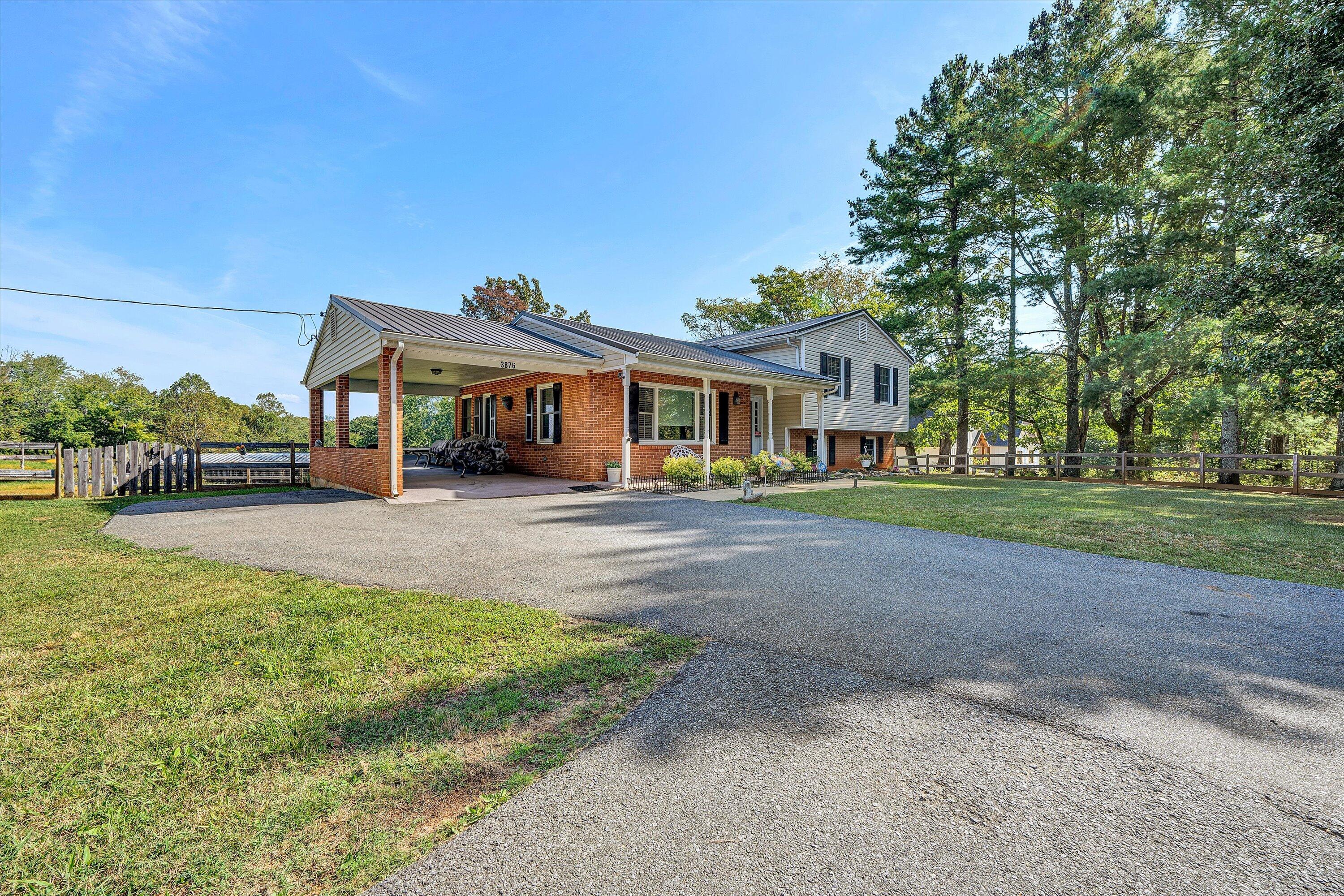3876 Shingle Block Road Bedford, VA 24523 - Photo 29 of 29 a front view of a house with a yard