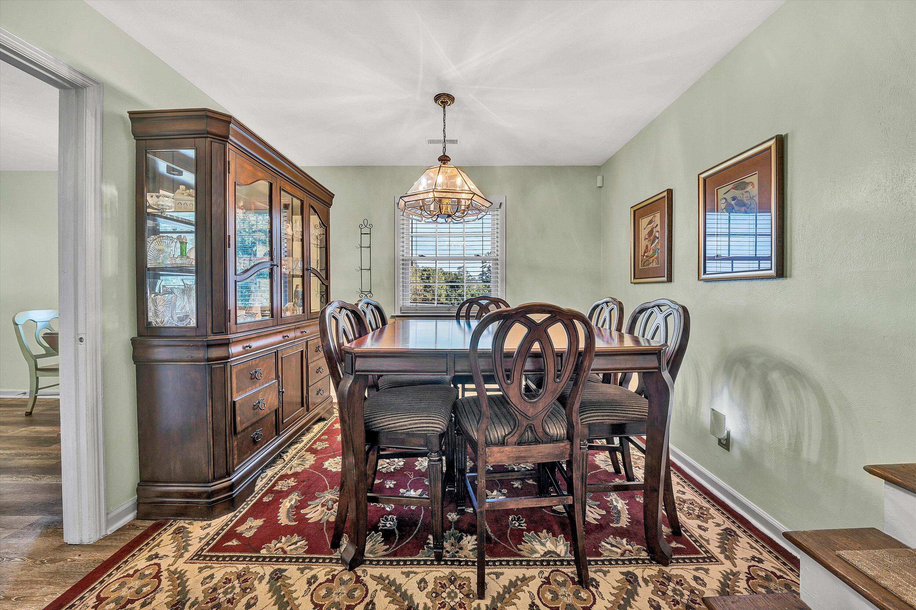 3876 Shingle Block Road Bedford, VA 24523 - Photo 5 of 29 a view of a a dining room with furniture window and wooden floor