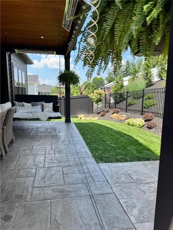 a view of swimming pool with a patio
