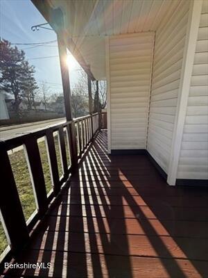 30 Danforth Avenue, Unit 2 Pittsfield, MA 01201 - Photo 3 of 12 a view of wooden balcony