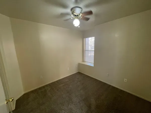 a bathroom with a toilet and a sink