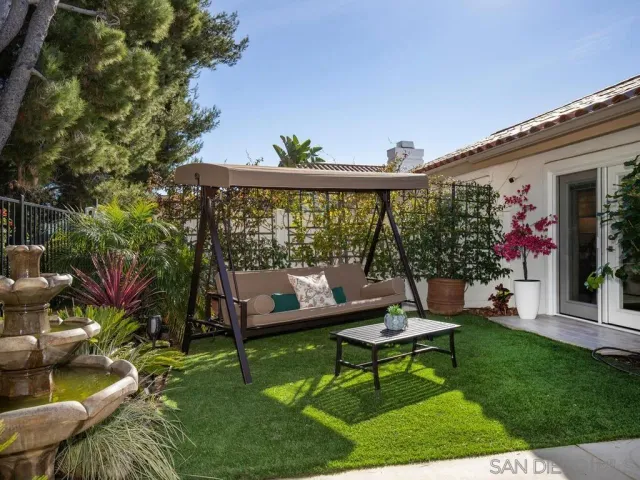 a view of a bench in the garden
