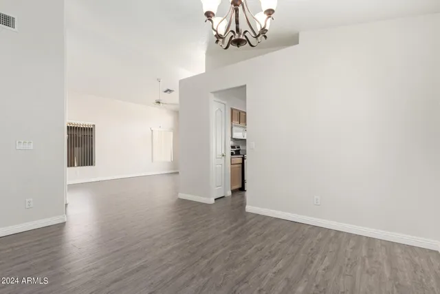 a view of a livingroom with wooden floor
