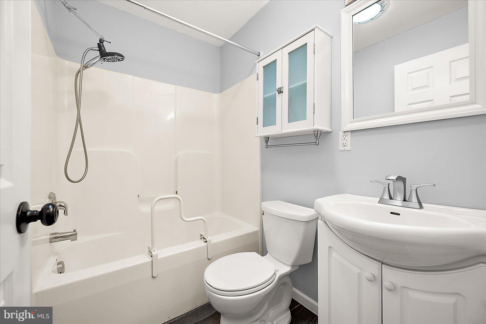 36405 Poplar Neck Road Willards, MD 21874 - Photo 32 of 50 a bathroom with a sink a toilet and a shower