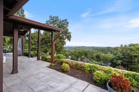 a view of a porch with a garden