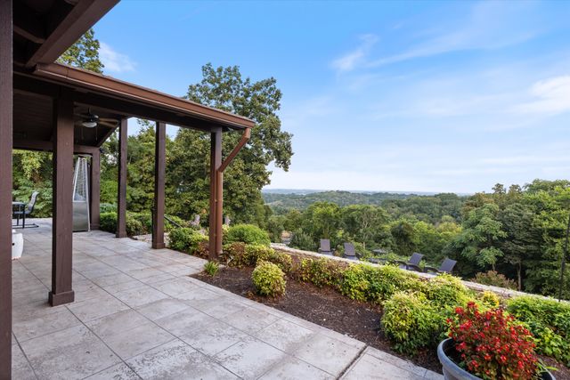 a view of a porch with a garden