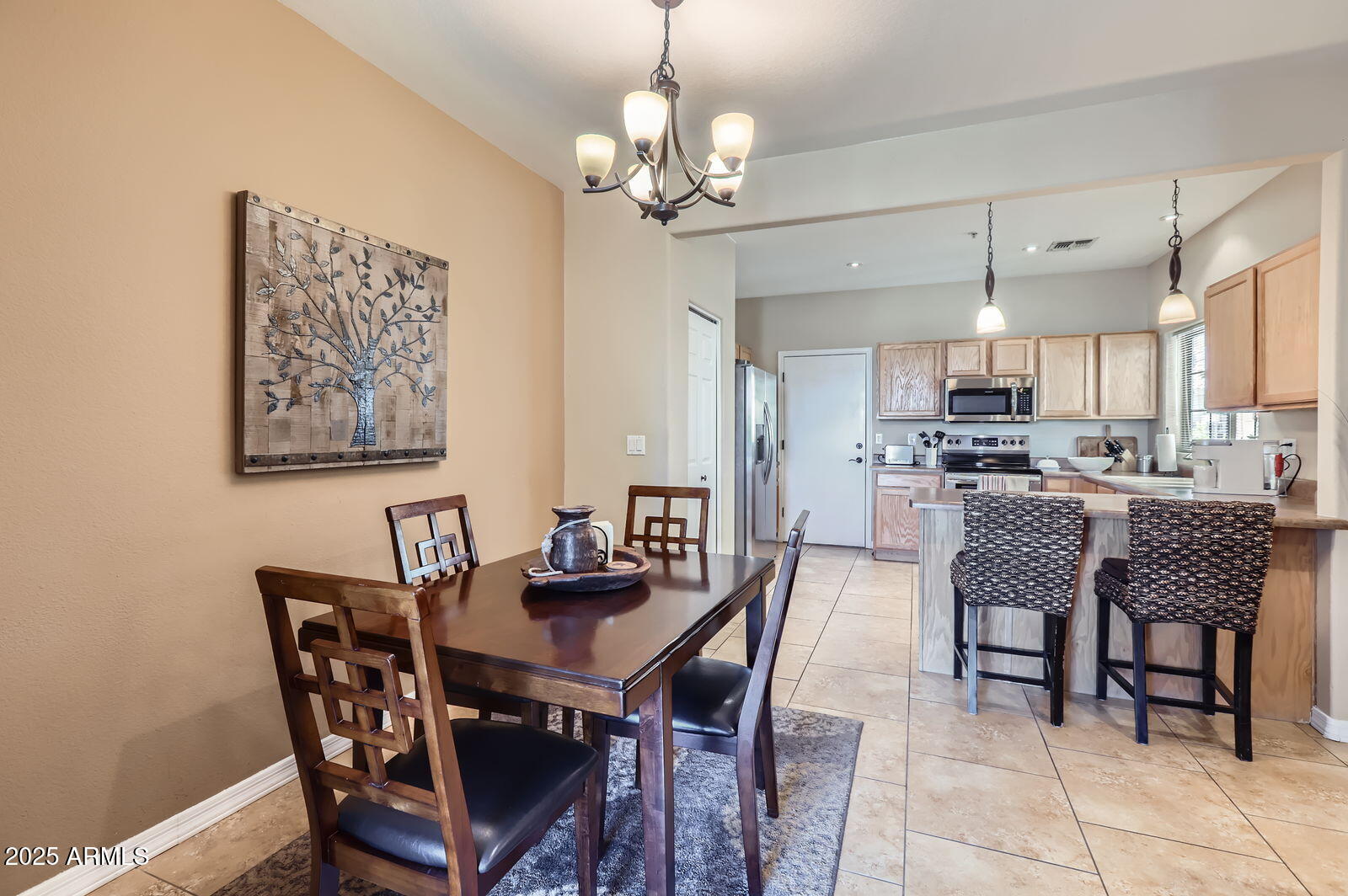 2801 North Litchfield Road, Unit 65 Goodyear, AZ 85395 - Photo 6 of 30 a view of a dining room with furniture