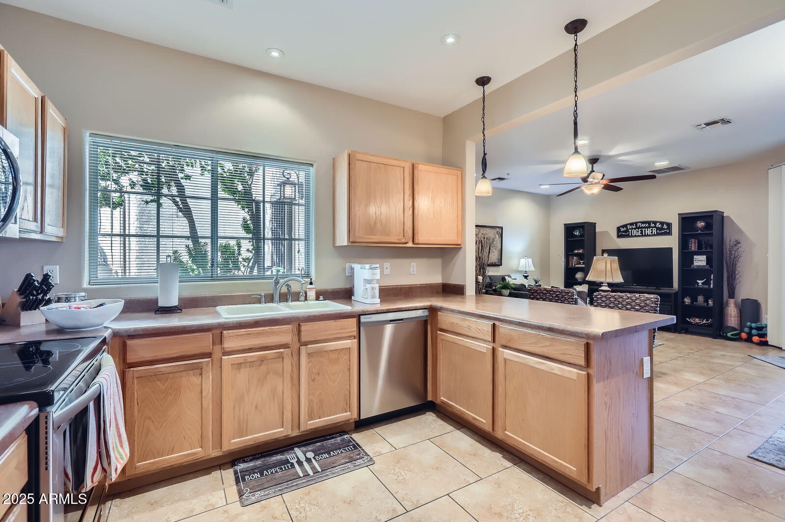 2801 North Litchfield Road, Unit 65 Goodyear, AZ 85395 - Photo 10 of 30 a kitchen with lots of counter top space