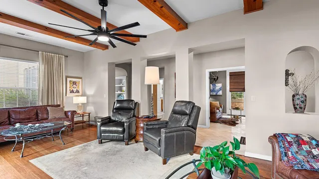 a kitchen with a stove a sink and a microwave