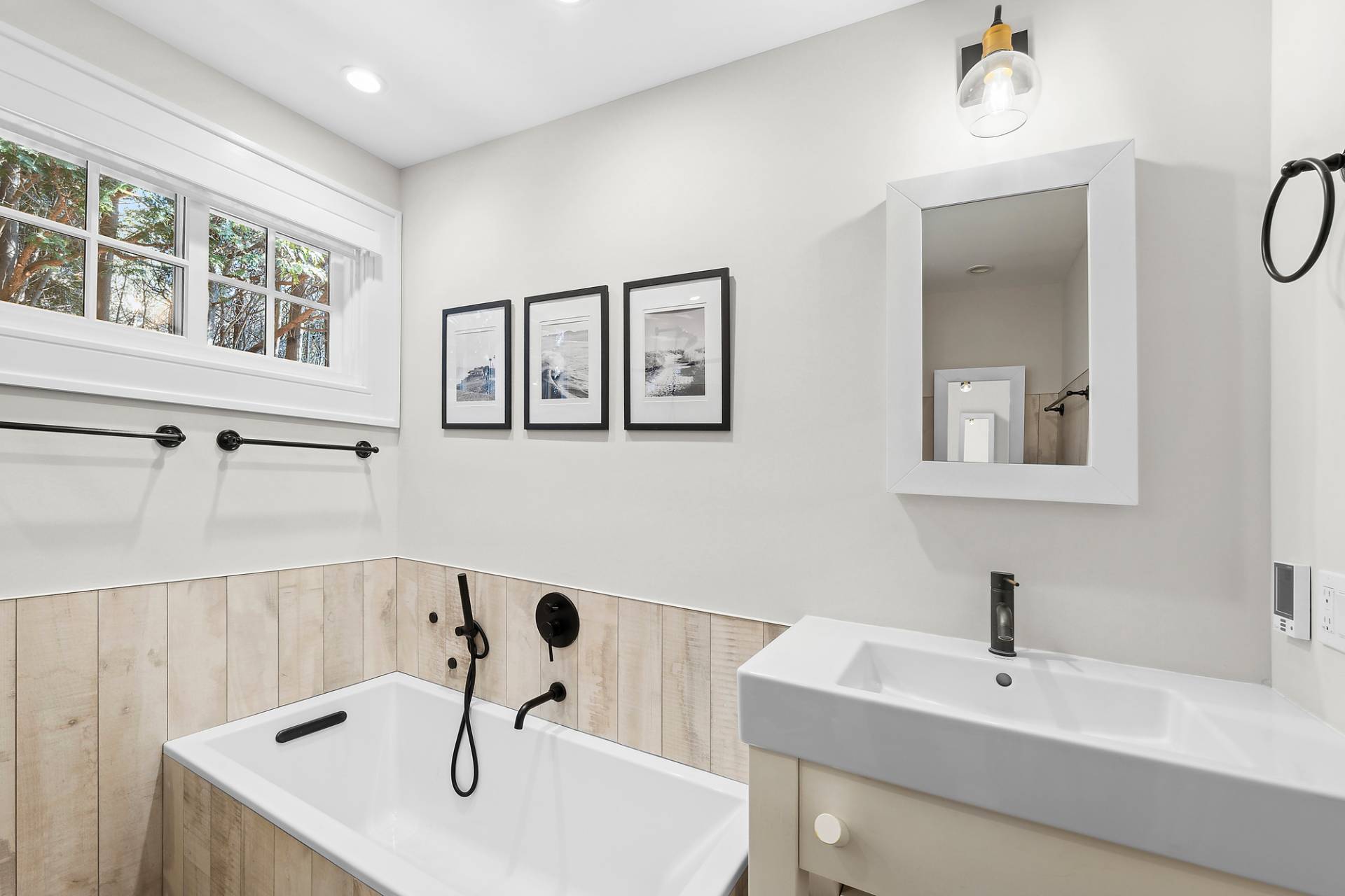 50 Sherrill Road East Hampton, NY 11937 - Photo 12 of 20 a bathroom with a sink and a mirror