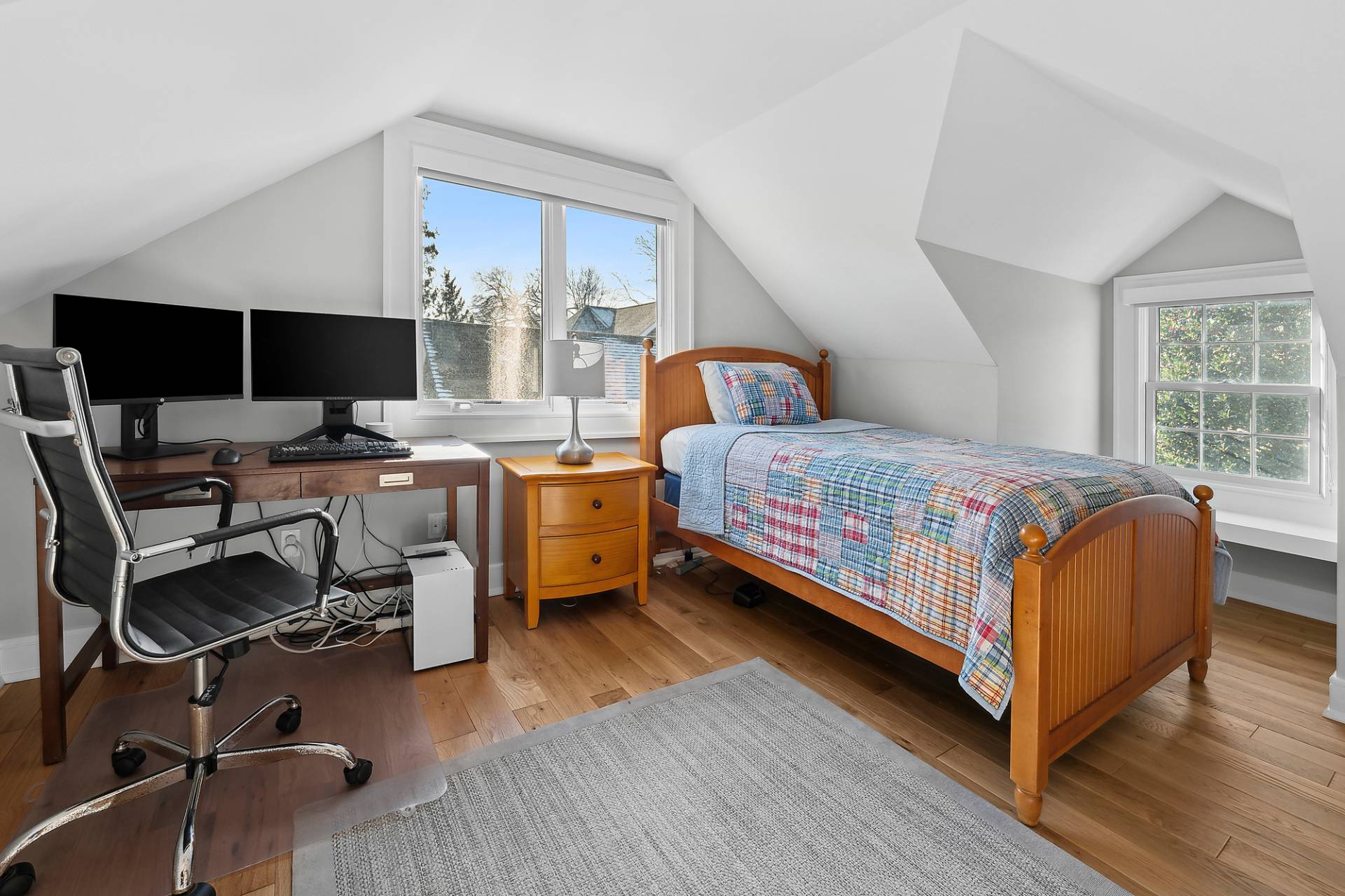 50 Sherrill Road East Hampton, NY 11937 - Photo 13 of 20 a bedroom with a bed and a desk