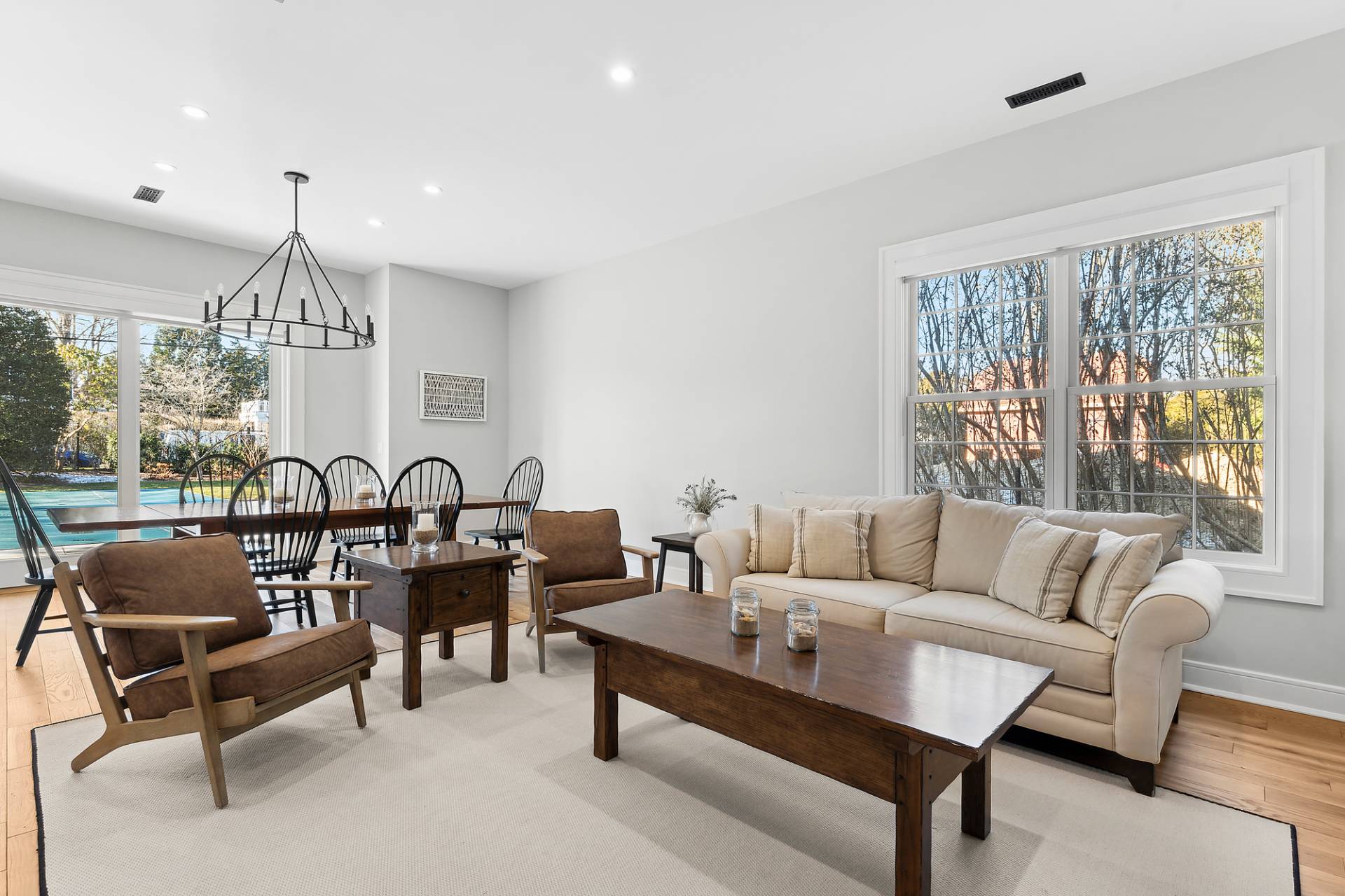 50 Sherrill Road East Hampton, NY 11937 - Photo 4 of 20 a living room with furniture and a chandelier