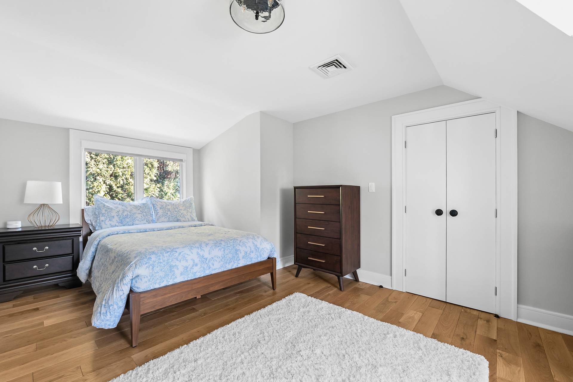 50 Sherrill Road East Hampton, NY 11937 - Photo 9 of 20 a bedroom with a bed and a closet