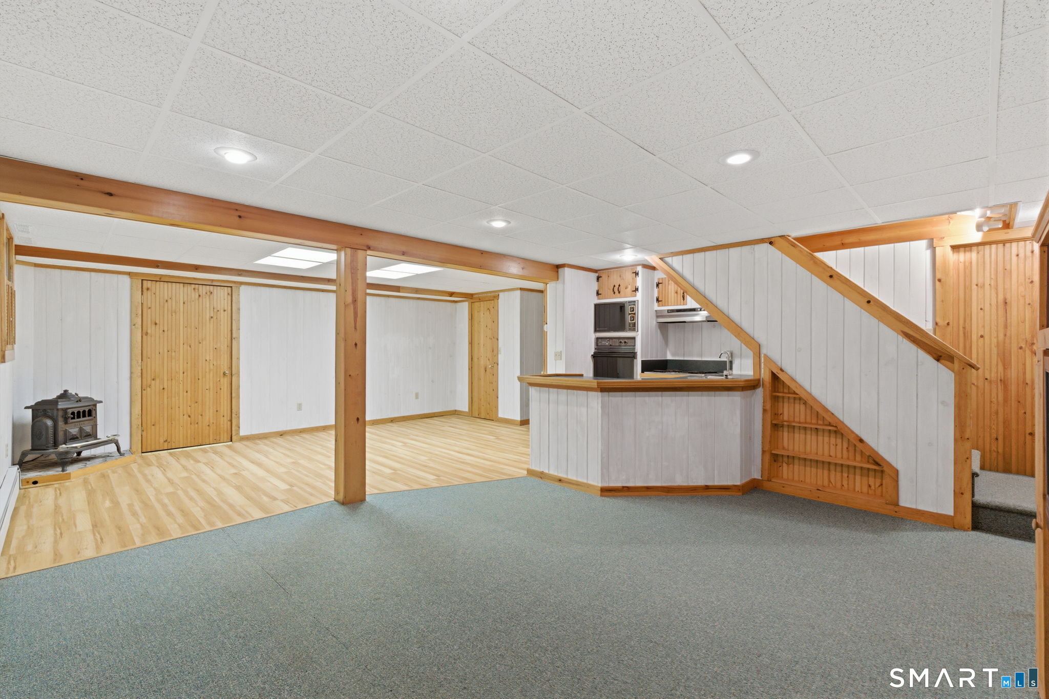 79 Buckboard Lane Bristol, CT 06010 - Photo 38 of 40 a view of an empty room with wooden floor