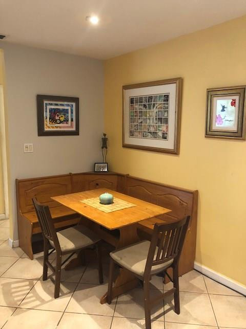 20942 Springs Terrace Boca Raton, FL 33428 - Photo 7 of 35 a room with a table and chairs